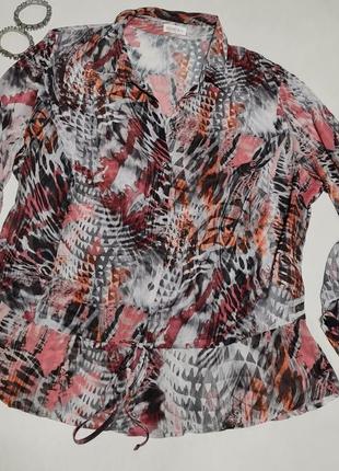 Строката блуза оригінального кроя