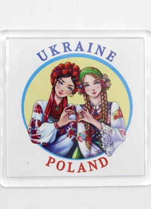 Патріотичний білий / синій магніт дівчата ukraine-poland 6,5 см на 6,5 см, із зображенням дівчата українка та полячка сувенір1 фото