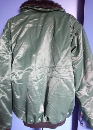 Супер теплая курточка трансформер бутылочный цвет6 фото