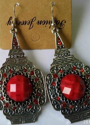 Сережки великі