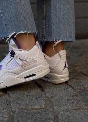 Жіночі шкіряні кросівки nike air jordan 4. білі з фіолетовим.6 фото