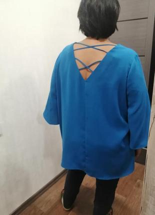 Розмір 60, блузка синього кольору, з гарною спинкою