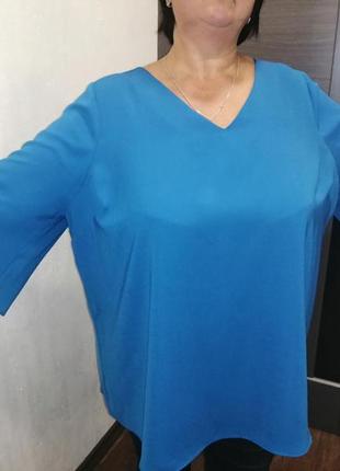 Розмір 60, блузка синього кольору, з гарною спинкою6 фото