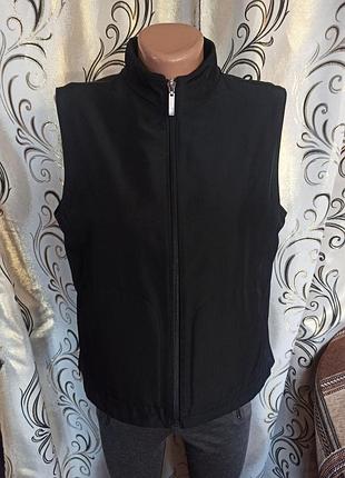Жіноча жилетка next