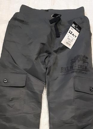 Джеггинсы карго bklwear германия штаны непромокаемая плащовка на подкладке на 10 лет5 фото