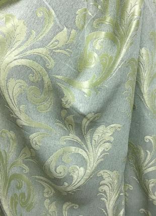 Портьерная ткань для штор блэкаут зеленого цвета с вензелями3 фото
