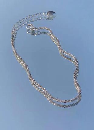 Сріблястий блискучий плетений браслет