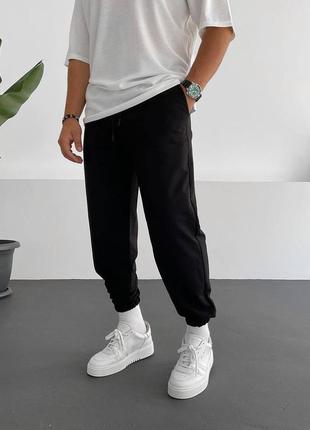 Мужские спортивные штаны / брендовые брюки на флисе в черном цвете / на каждый день3 фото