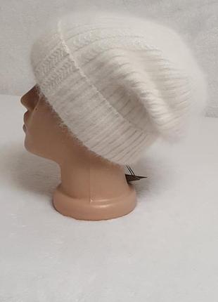 Тепла пухнаста жіноча шапка з ангори3 фото