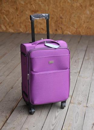 Фіолетова валіза розмір s vali's