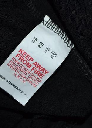 Облегающая черная кружевная юбка в комплекте с трусиками5 фото