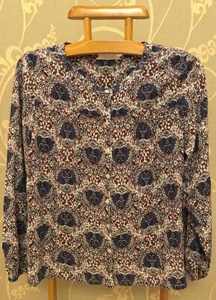 Очень красивая и стильная брендовая блузка в узорах..100% вискоза.