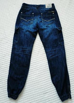 Жіночі джинси джогери з накладними кишенями parisian denim3 фото