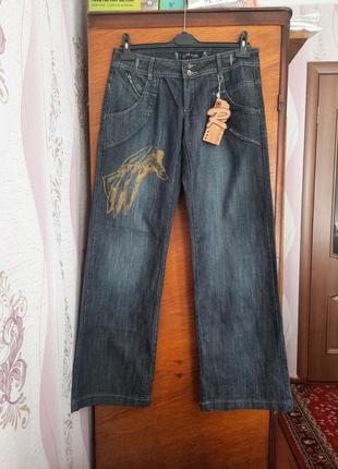 Широкие джинсы с рисунком1 фото