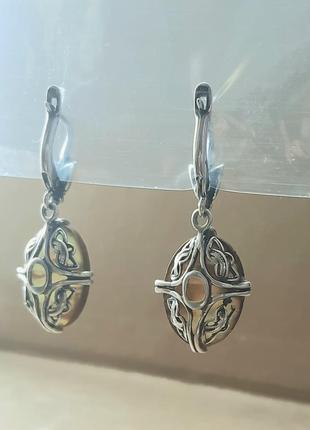 Дизайнерские авторские серебряные сережки с морским перламутром10 фото