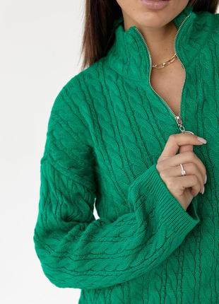 Жіночий подовжений светр у косичку з блискавкою на горловині.3 фото