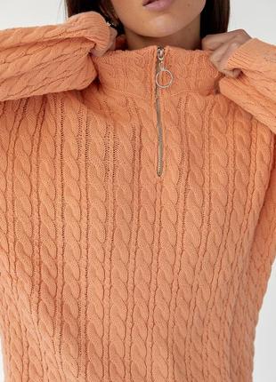 Жіночий подовжений светр у косичку з блискавкою на горловині.6 фото