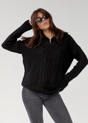 В'язаний жіночий светр з косами та коміром на блискавці.4 фото