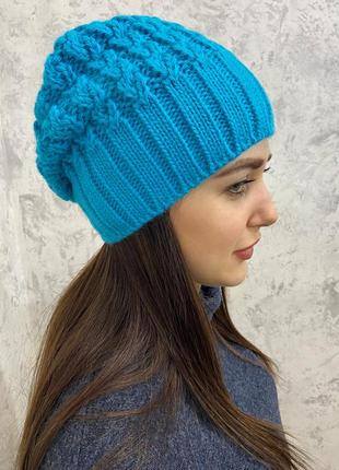 Жіноча шапка дінара на флісі блакитного кольору4 фото