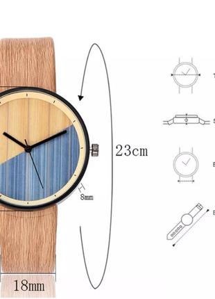 Оригінальний жіночий наручний годинник з імітацією під дерево «wood watch» у коричневому корпусі5 фото