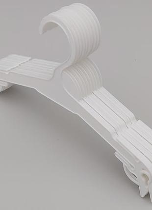 Плечики длина 27 см, в упаковке 10 штук.  v-n227  белого цвета