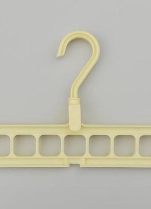 Диво-вішалка органайзер для одягу бежевого кольору