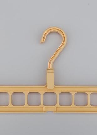 Диво-вішалка органайзер для одягу бежевого кольору