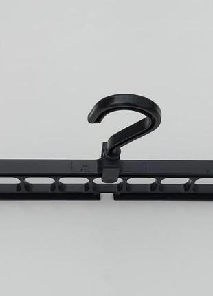 Диво-вішалка органайзер для одягу чорного кольору3 фото