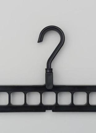 Диво-вішалка органайзер для одягу чорного кольору1 фото