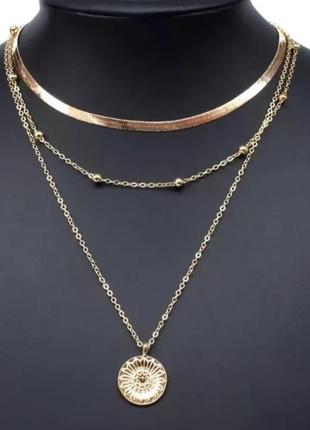 Многослойное ожерелье-цепочка с подвеской золотого солнца2 фото