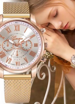 Женские часы с сетчатым ремешком цвета розового золота