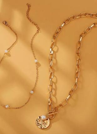 Многослойное ожерелье-цепочка с подвеской и искусственного жемчуга в золотом цвете3 фото
