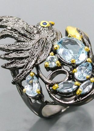 Набор серебряных украшений ручной работы с натуральными небесно-голубыми топазами5 фото