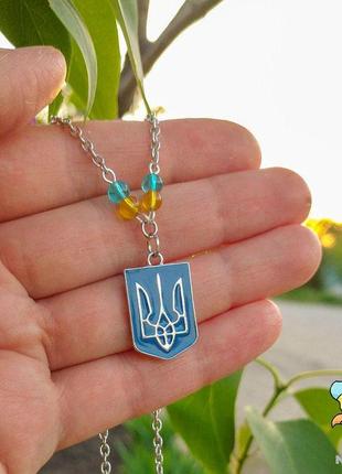 Кулон "україночка. тризуб герб україни". колір срібло жовто-блакитні намистини