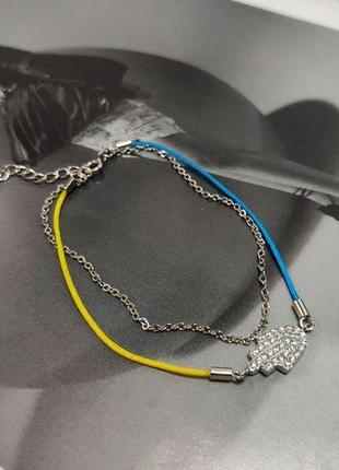 Серебряный браслет "хамса" на синей и желтой нити8 фото
