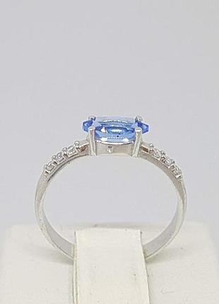 Срібне кільце момент з кварцом tanzanite і фіанітами. артикул 1309/1р-qtanz 17