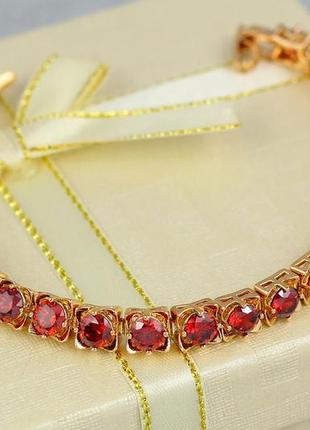 Браслет xuping jewelry з червоними каменями в квадратній оправі по всій довжині 19 см 6 мм золотистий2 фото