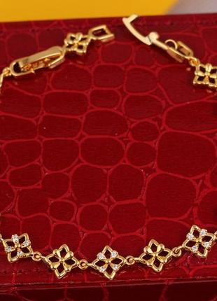 Браслет xuping jewelry квадраты с четырьмя лепестками в середине 18 см 7 мм золотистый1 фото