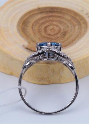 Кольцо серебряное с голубым кварцем london blue и циркониями 925 пробы.4 фото