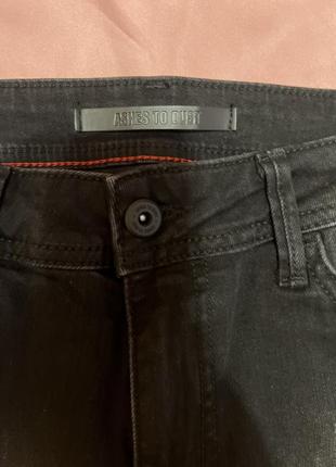 Чорні сірі в потертостях та дирках рванках джинси по ніжці2 фото