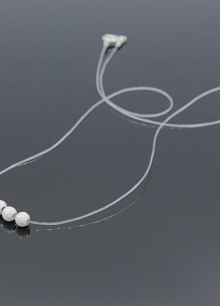 Срібне кольє на волосіні з намистинами