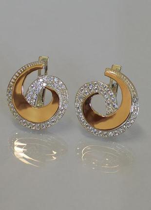 Круглі шикарні срібні сережки з золотими пластинами і цирконієм4 фото