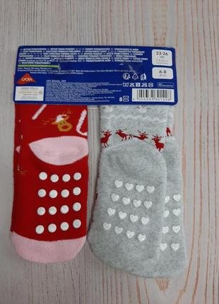 Новорічні махрові шкарпетки з тормозками.2 фото