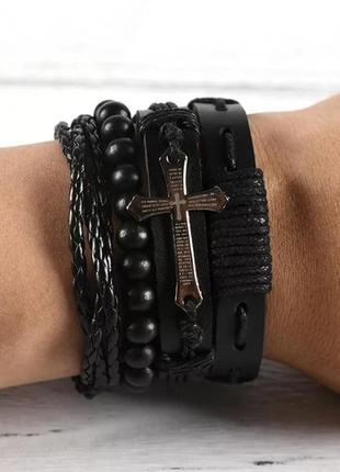 Набор кожаных браслетов крест черные на завязках6 фото