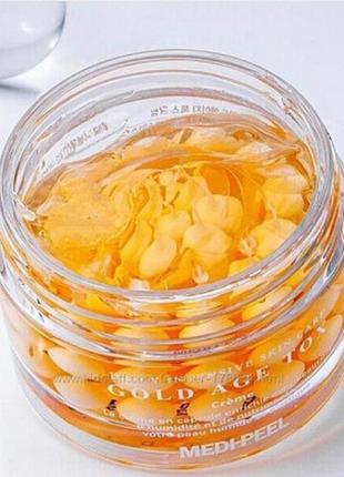 Крем для обличчя антивіковий капсульний з екстрактом золотого шовкопряду medi-peel gold age tox cream 50ml7 фото