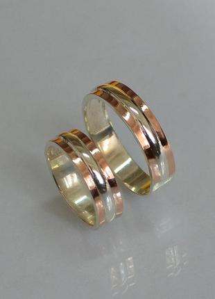 Серебряное обручальное кольцо с вставками из золота
