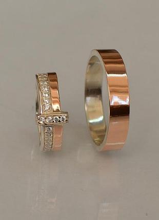 Пара обручальных колец из серебра с вставками из золота