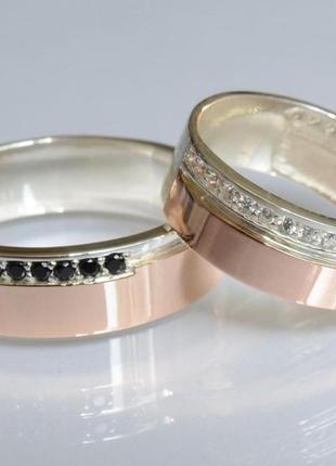 Пара обручок зі срібла з вставками з золота