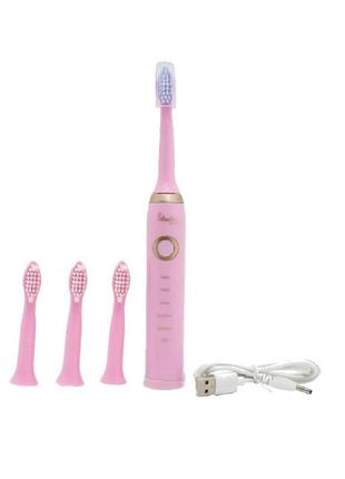 Электрическая зубная щетка shuke с 4-мя насадками розовая1 фото