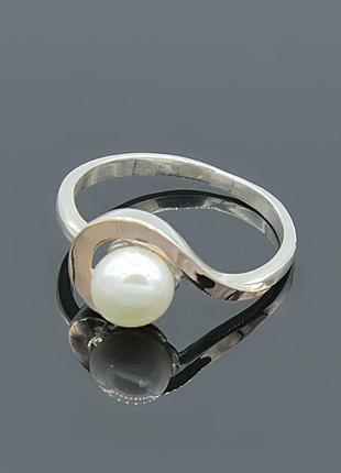 Срібна каблучка з золотими вставками та перлиною загадка